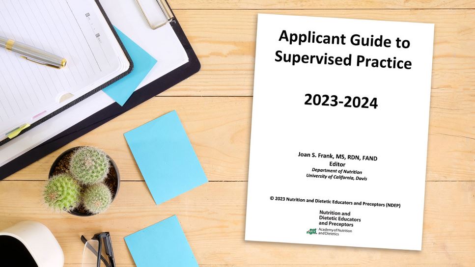 Copy of Applicant Guide to Supervised Practice: 2023-2024 lying on a desk.