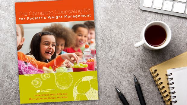 Copy of The Complete Counseling Kit for Pediatric Weight Management lying on a desk.