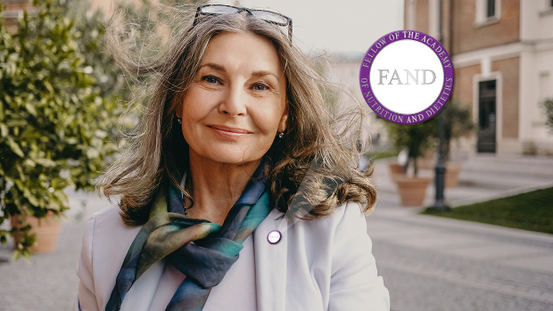 woman wearing a RAND pin