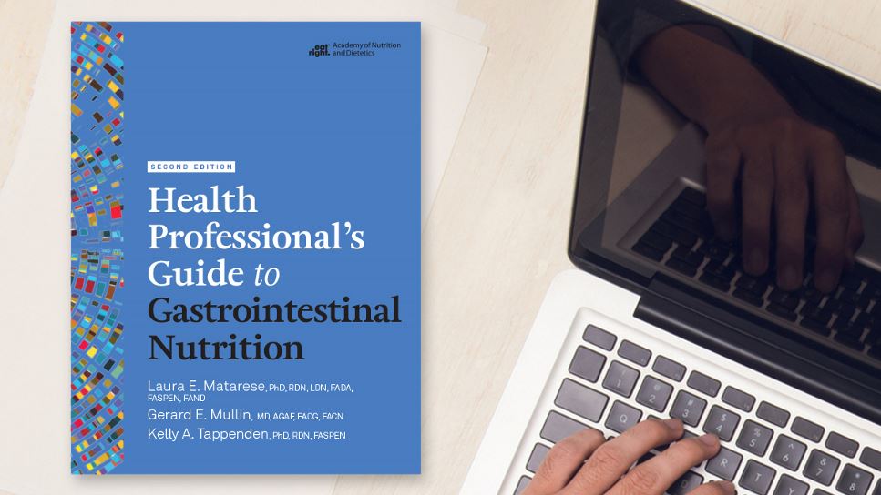 Copy of Health Professional's Guide to Gastrointestinal Nutrition, 2nd Ed. lying on a desk.