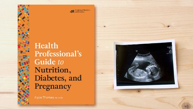 Copy of Health Professional's Guide to Nutrition, Diabetes, and Pregnancy lying on a desk.