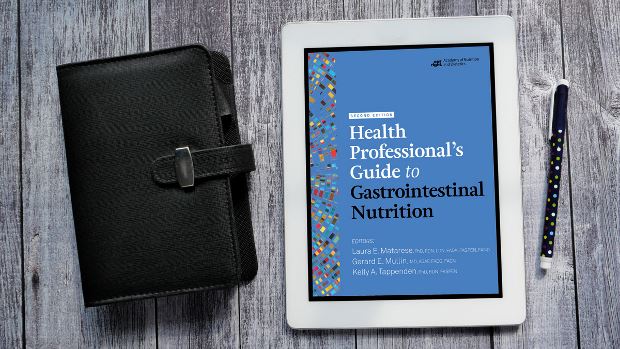 Health Professionals Guide to Gastrointestinal Nutrition, 2nd Ed. on a tablet screen, with the tablet lying on a desk.