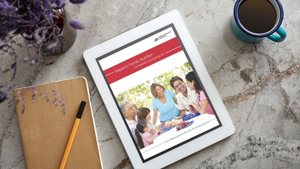 Hispanic Family Nutrition: Complete Counseling Kit on a tablet screen, with the tablet lying on a desk.