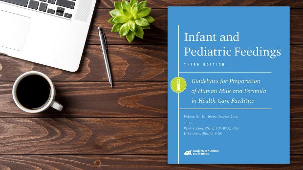 Copy of Infant and Pediatric Feedings, 3rd Ed. lying on a desk.