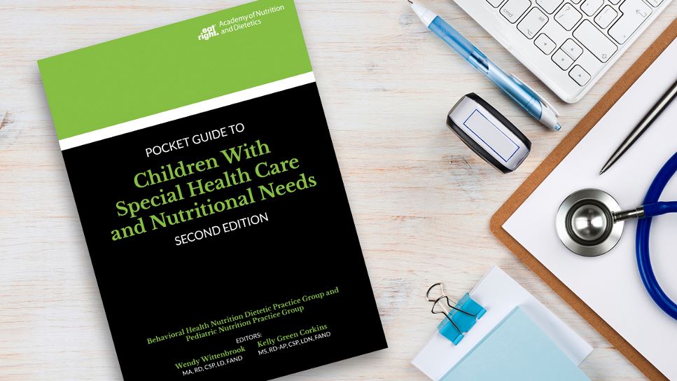 Copy of Pocket Guide to Children with Special Health Care and Nutritional Needs, 2nd Ed. lying on a desk.