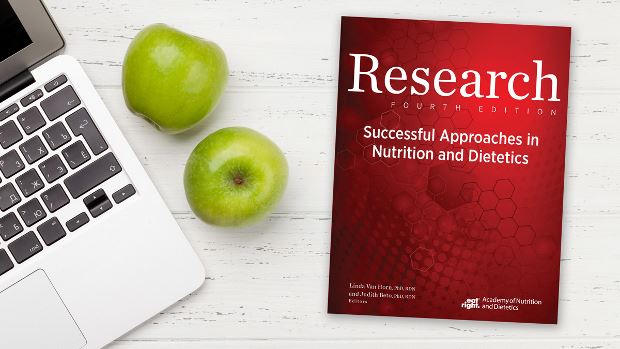 Copy of Research: Successful Approaches in Nutrition and Dietetics, 4th Ed. lying on a desk.