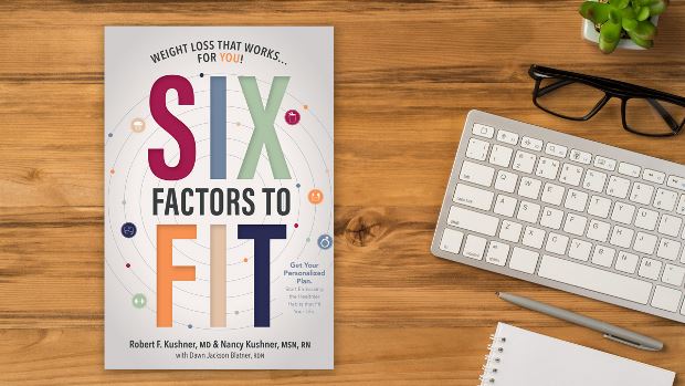 Copy of Six Factors to Fit: Weight Loss That Works for You! lying on a desk.