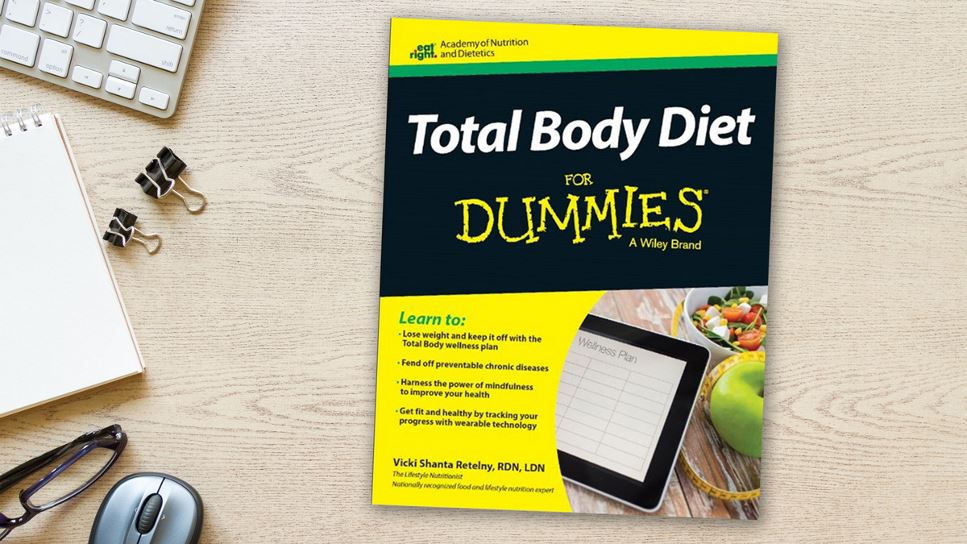 Copy of Total Body Diet for Dummies lying on a desk.